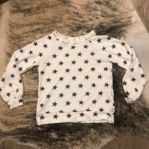 White shirt with black stars